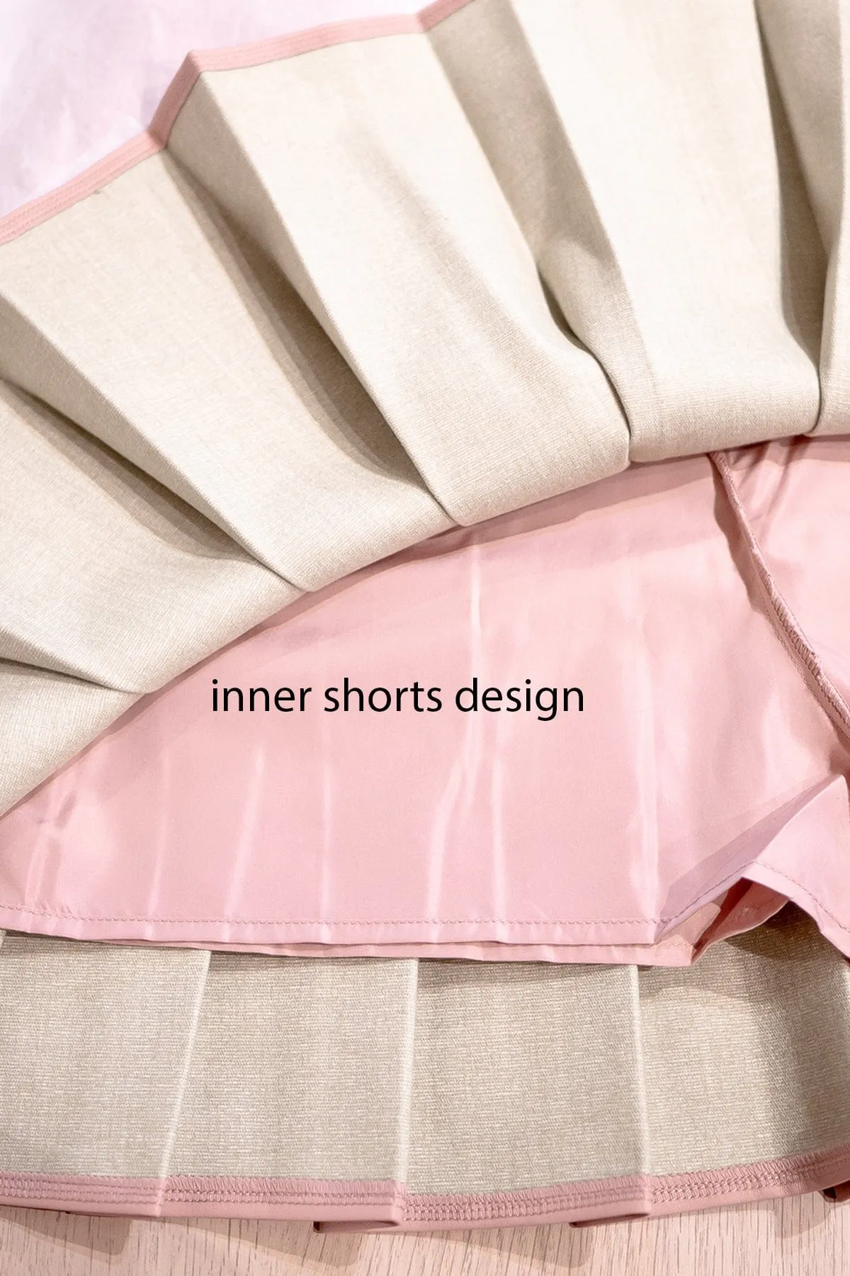 REMY PLEATED LEATHER SKORTS IN PINK